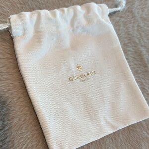 Guerlain Luxurious Cream Pouch with Gold Logo